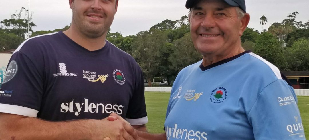 Doug McGrath receives his volunteer award from Sam Gainsford