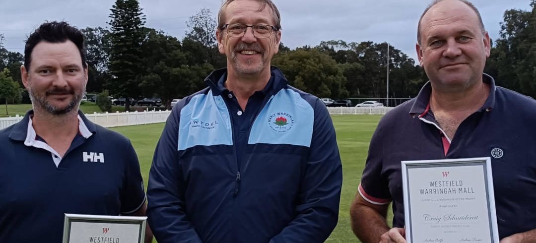 Andrew Smith & Craig Schneidereit receive their volunteer awards