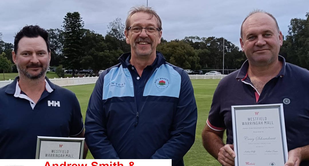 Andrew Smith & Craig Schneidereit receive their volunteer awards
